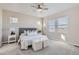 Serene bedroom featuring plush carpeting, neutral colors, and ample natural light for a relaxing retreat at 711 N Waterloo Ct, Aurora, CO 80018