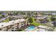 Scenic aerial view of the condo community and the refreshing community pool at 10211 Ura Ln # 1-202, Thornton, CO 80260