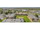 Discover community living with lush green spaces and manicured apartment blocks, as captured in this expansive aerial photograph at 10211 Ura Ln # 1-202, Thornton, CO 80260