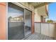 This outdoor balcony offers a seamless transition to the indoors, with sliding glass doors, offering a private retreat at 10211 Ura Ln # 1-202, Thornton, CO 80260