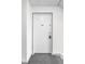 A secure front door welcomes you home, ensuring privacy and safety in this well-maintained residential building at 10211 Ura Ln # 1-202, Thornton, CO 80260