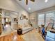 The living room includes a large window with blinds, a carpet area, and a view of the dining area at 5231 S Cody St, Littleton, CO 80123
