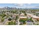 Wide aerial view of the neighborhood, including cityscape and mountain views at 3908 Mariposa St, Denver, CO 80211