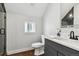 Clean bathroom with walk-in shower and gray vanity at 3908 Mariposa St, Denver, CO 80211