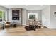 Bright dining area with a modern fireplace and hardwood floors at 3908 Mariposa St, Denver, CO 80211