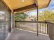 Wood balcony with railings, looking out over neighboring houses at 2615 Oak Dr # 5, Lakewood, CO 80215