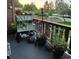 Outdoor balcony showcasing potted plants and decorative garden ornaments at 6504 Ralston Rd # A, Arvada, CO 80002