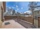 Spacious wood deck with seating area, perfect for enjoying outdoor living and neighborhood views at 6504 Ralston Rd # A, Arvada, CO 80002