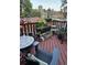 Cozy deck featuring a mosaic table, comfortable seating and beautiful landscaping at 6504 Ralston Rd # A, Arvada, CO 80002