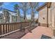 This spacious wood deck features a cozy seating area with a view of the surrounding landscape at 6504 Ralston Rd # A, Arvada, CO 80002