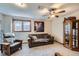 Relaxing living room area with a plush couch, chair, and natural light at 6504 Ralston Rd # A, Arvada, CO 80002