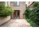 Private backyard patio with flagstone and lush landscaping at 126 Garfield St, Denver, CO 80206