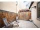 Private patio with wooden chairs and pergola for relaxing at 126 Garfield St, Denver, CO 80206