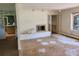 Living room with brick fireplace and hardwood floors at 5521 Colorow Dr, Morrison, CO 80465