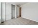 Bright bedroom featuring a closet and neutral carpet at 9072 Telluride Ct, Commerce City, CO 80022