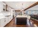 Open-concept kitchen with large island, stainless steel appliances, and a bar area for entertaining at 10738 Braesheather Ct, Highlands Ranch, CO 80126
