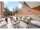 Charming outdoor patio with comfortable seating and stylish decor at 2400 E Cherry Creek South Dr # 209, Denver, CO 80209