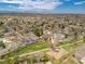 Charming neighborhood with a community park and mountain views in this aerial view of the property at 13020 Julian Ct, Broomfield, CO 80020