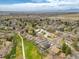 Wonderful aerial shot highlighting the property's proximity to a park and green space with mountain views at 13020 Julian Ct, Broomfield, CO 80020