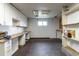 Unfinished basement workshop with ample storage and workbench space at 13020 Julian Ct, Broomfield, CO 80020