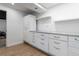 Finished basement features custom cabinets and countertops at 13020 Julian Ct, Broomfield, CO 80020