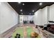 Finished basement gym with black ceiling, recessed lights, and light gray vinyl flooring at 13020 Julian Ct, Broomfield, CO 80020
