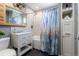 Updated bathroom with a combination shower and tub at 13020 Julian Ct, Broomfield, CO 80020