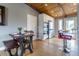 Cozy dining area adjacent to a modern kitchen with stainless steel appliances and ample cabinetry at 13020 Julian Ct, Broomfield, CO 80020