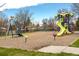 A colorful playground features slides and climbing structures, providing a fun and safe play area for children at 13020 Julian Ct, Broomfield, CO 80020