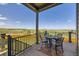 Outdoor deck with seating and scenic views, perfect for dining al fresco at 16459 W 86Th Pl # B, Arvada, CO 80007