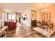 Spacious living room and dining area boasts hard wood floors and plenty of light at 16459 W 86Th Pl # B, Arvada, CO 80007