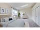 Cozy bedroom with neutral tones, skylight, and plush carpeting at 8418 Everett Way # C, Arvada, CO 80005