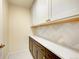 Well-organized pantry features ample storage, quartz countertops, and stylish cabinetry at 8418 Everett Way # C, Arvada, CO 80005
