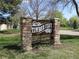 Neighborhood sign featuring Timber Cove in a peaceful community at 8418 Everett Way # C, Arvada, CO 80005