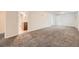 Basement with carpeting and adjoining bathroom at 16755 E Union Ave, Aurora, CO 80015