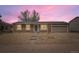 Charming brick home featuring a well-kept front yard with easy access to the garage at 16755 E Union Ave, Aurora, CO 80015