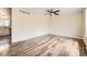 Bright living room featuring gorgeous hard wood floors and lots of natural light at 16755 E Union Ave, Aurora, CO 80015