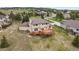 An aerial perspective of the property, highlighting its backyard with a large deck at 937 Caribou Dr, Monument, CO 80132