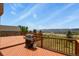 Outdoor deck with grill and mountain views at 937 Caribou Dr, Monument, CO 80132
