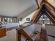 Spacious bedroom with a-frame ceilings and a view at 513 Hyland Dr, Evergreen, CO 80439