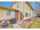 Inviting home exterior with a neatly landscaped yard and charming entryway, showcasing curb appeal at 3355 S Flower St # 107, Lakewood, CO 80227