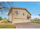 This home features a two-car garage and a small balcony on the second floor at 3355 S Flower St # 107, Lakewood, CO 80227