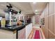 Concession area featuring a popcorn machine, snacks, drinks, and a wine rack at 6300 E 17Th Avenue Pkwy, Denver, CO 80220