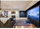 Entertainment room with large viewing screen and comfortable seating at 6300 E 17Th Avenue Pkwy, Denver, CO 80220