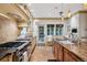 Spacious kitchen with granite countertops, stainless steel appliances, and a cozy breakfast nook at 6300 E 17Th Avenue Pkwy, Denver, CO 80220