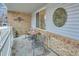 Cozy front porch area, perfect for relaxing with outdoor furniture and decorative touches at 3863 S Bahama St, Aurora, CO 80013