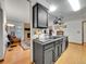 Well-designed kitchen featuring a sink, stainless steel appliances, and opening to the living room at 3863 S Bahama St, Aurora, CO 80013