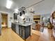 Charming kitchen open to the living room with stainless steel appliances and a cozy fireplace at 3863 S Bahama St, Aurora, CO 80013