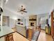 Bright living room with a brick fireplace, hardwood floors, and cozy seating at 3863 S Bahama St, Aurora, CO 80013