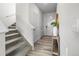 Bright entryway features stairs, hardwood floors, and decorative accents at 27674 E 7Th Dr, Aurora, CO 80018
